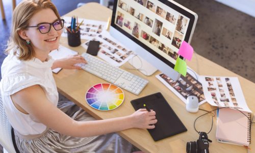 young-caucasian-female-graphic-designer-working-on-F7SDUEX.jpg